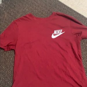 Maroon Nike shirt
